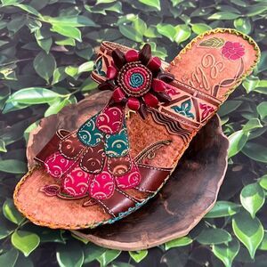 Elite brown magenta, teal etched, weave sandal wedges with flower appliqué